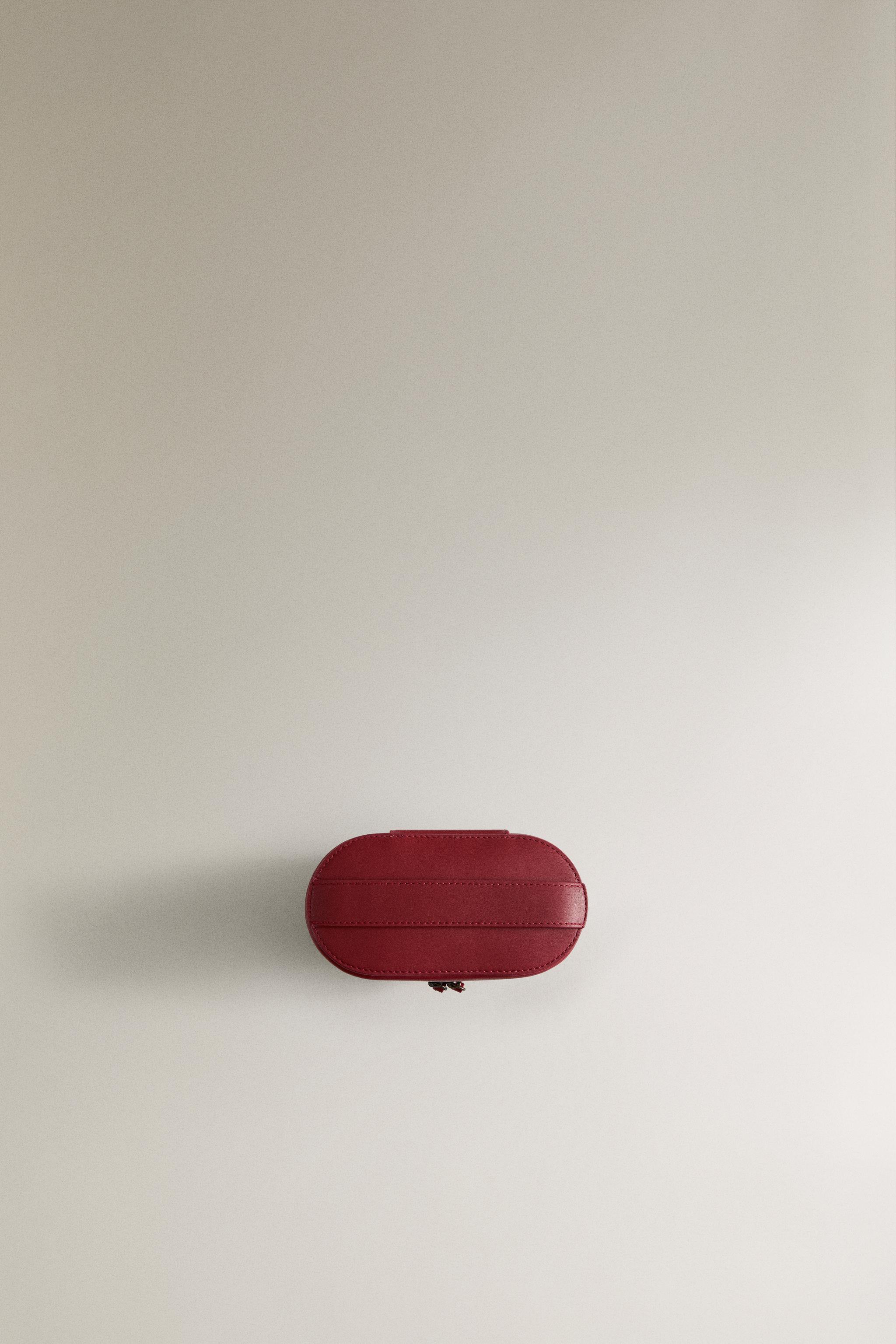 MINI TROUSSE DE TOILETTE RIGIDE EN CUIR